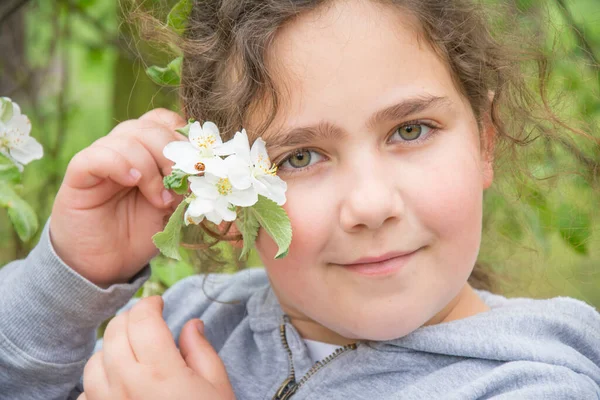 Spring Day Little Girl Put Blossoming Branch Apple Tree Which — Stock Photo, Image