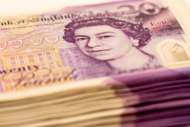 Kraliçe 2. Elizabeth 'in portresinin yer aldığı İngiltere' den gelen 20 pound 'luk banknotların yakın çekimi..