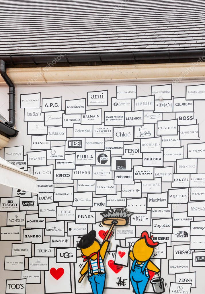 A mural featuring brand logos being 