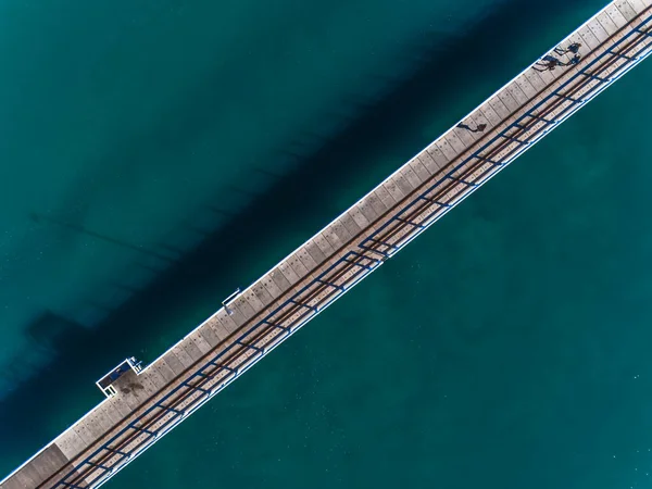 stock image Aerial view of Busselton Jetty wharf. Sunny day in summer with clear water. Travel to Busselton, Western Australia. Top view. Coastal, Seascape