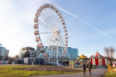 Krakow, Poland January 1, 2023. View of the Ferris wheel Krakow Eye on a sunny day. Sights of Krakow. Poland.