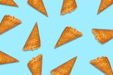 Ice cream cones on blue background. Food. Dessert.