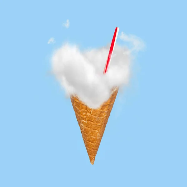 On a blue background, ice cream cone, clouds, and tube for a cocktail. Air ice cream concept. Food. Dessert.