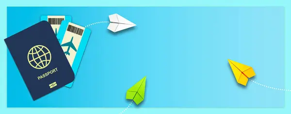 Travel concept. Passport with tickets, and paper planes on blue background.Copy space.Travel banner. Travel background.