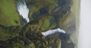 Fjadrargljufur canyon Winding river between bizarre steep cliff rock formations Iceland, Europe.