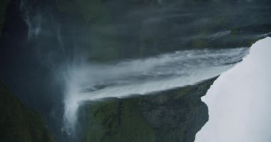 Seljalandfoss vertical waterfall in evening dusk light, Iceland.