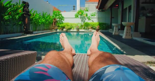 Pov Relaxed Man Resting Lounger Holiday Vacation Blue Swimming Pool — Video