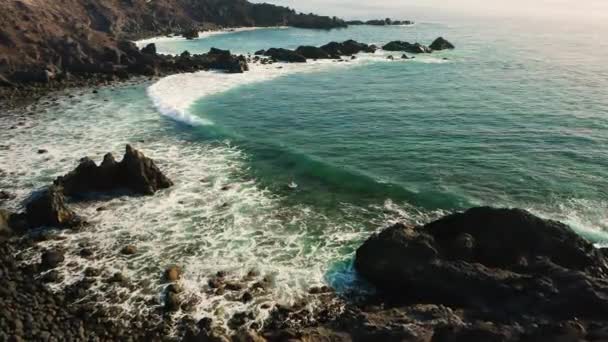 Pristine Volcanic Calm Ocean Beach Waves Crashing Sand Stones Rocky — Vídeo de Stock