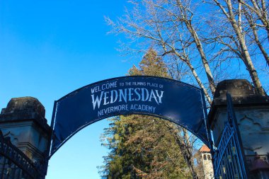 Busteni, Romania - December 30, 2022: The welcome sign to Cantacuzino Castle or Nevermore Academy - the place where the Wednesday series film was filmed