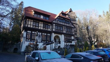 Sinaia, Romania - December 31, 2022: Carol Gastro Bierhaus restaurant next to Peles Castle in the Carpathian Mountains, Prahova County