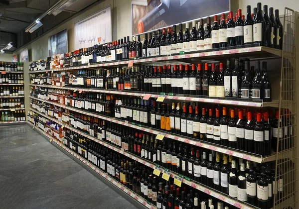 stock image Winterthur, Switzerland - October 21, 2023: bottles of wines on display at Coop grocery store in Winterthur, Switzerland on October 21, 2023