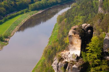 Beautiful summer view of Elbe river from Bastei view pont. Colorful morning scene of Saxon Switzerland national park, Germany, Europe. Splendid landscape of Sandstone Mountains, Saxony. clipart