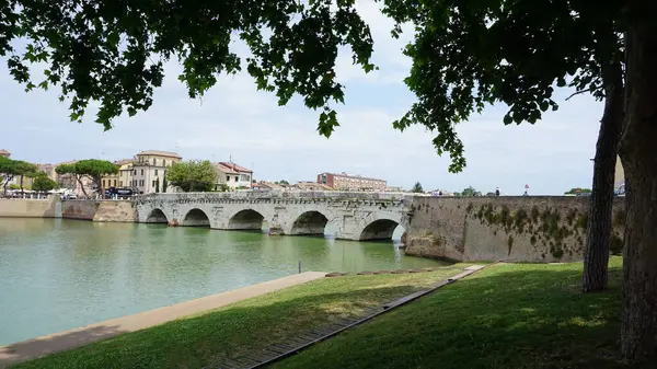 stock image Historical roman Tiberius Bridge over Marecchia river in Rimini at Italy