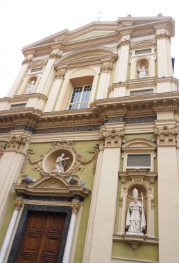 Nice, France - September 22, 2024: Cathedrale Sainte-Reparate in Nice is a stunning Baroque masterpiece, known for its vibrant Facade and majestic dome, standing proudly in the heart of the Old Town since the 17th century clipart