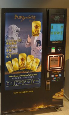 Singapore - January 21, 2024: PureGold.sg ATM. PureGold.sg offers a secure and convenient platform to buy, sell, and store physical gold. Enjoy competitive prices, free storage, and easy transactions clipart