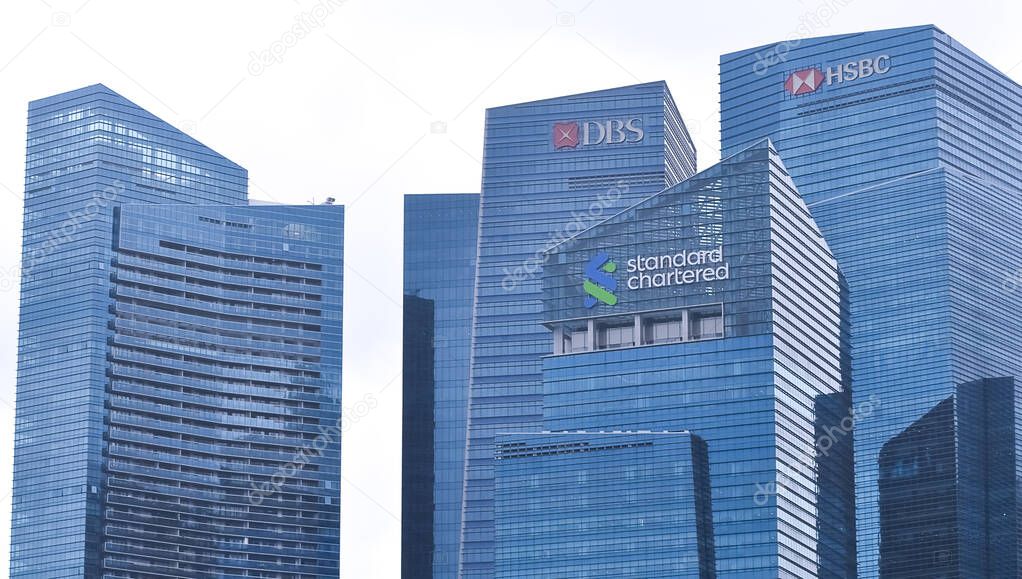 Singapore - January 20, 2024: Skyscrapers of two big banks with their logos as seen from Gardens by the Bay are the DBS Bank and HSBC bank.