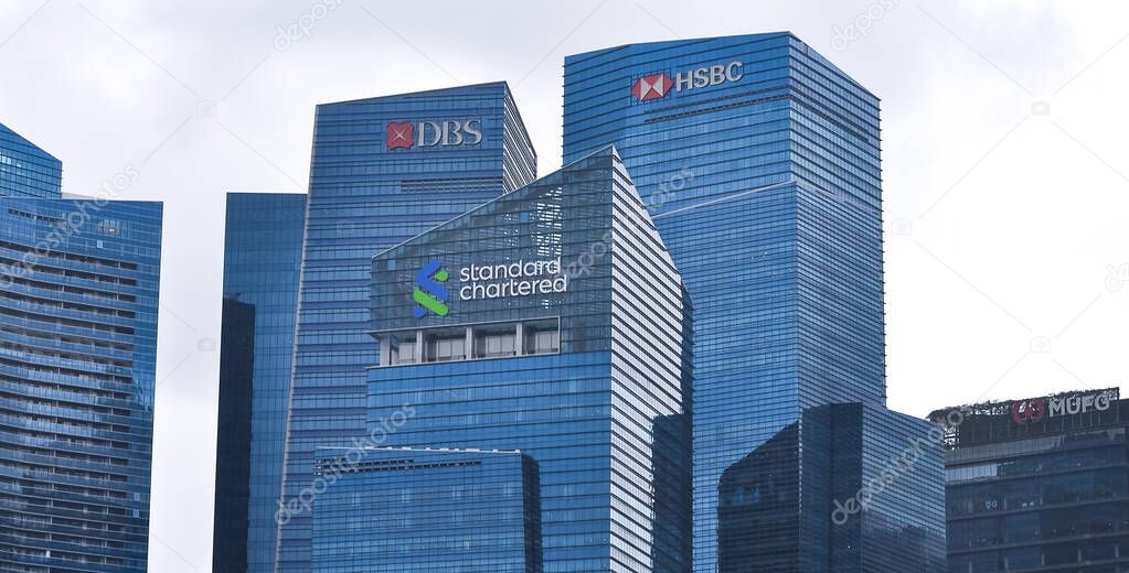 Singapore - January 20, 2024: Skyscrapers of two big banks with their logos as seen from Gardens by the Bay are the DBS Bank and HSBC bank.