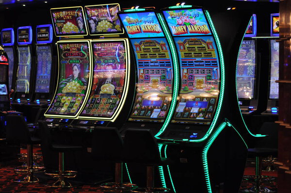 Corfu, Greece - August 9, 2024: View of the casino and gaming tables inside the MSC Fantasia, a cruise ship owned by MSC Cruises.