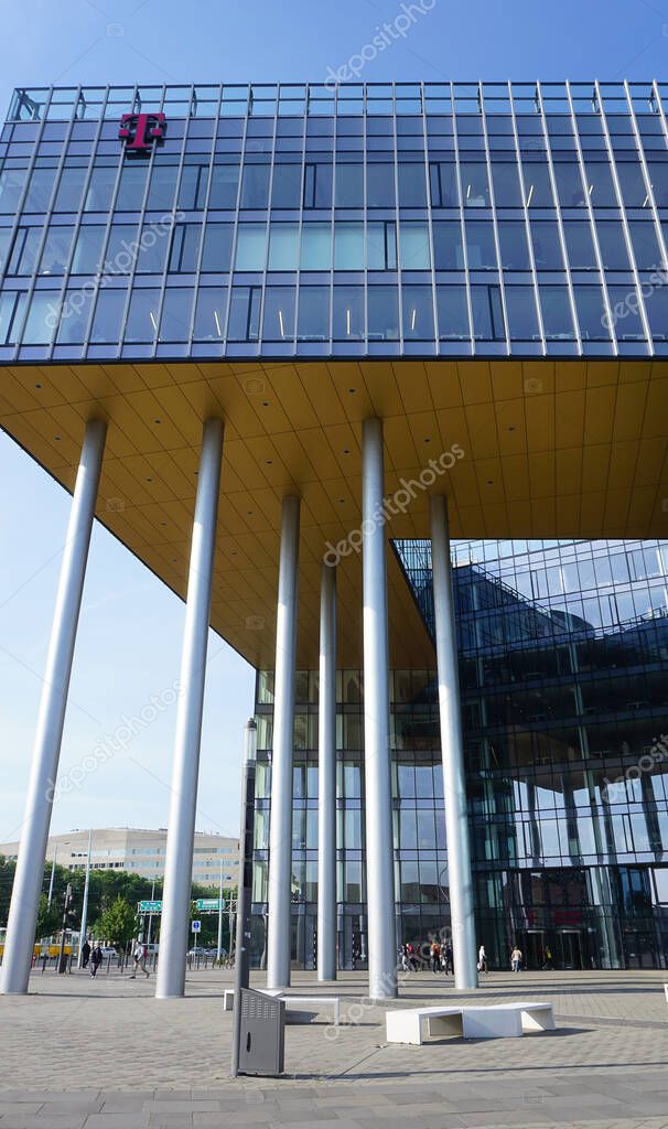 Budapest, Hungary - May 14, 2025: DT-ITS business service centre in Hungary logo on a building with blue sky background. Since its formation in 2006, DT-ITS IT service provider.