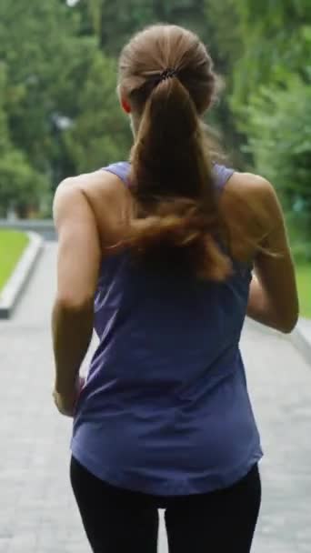 Vertical Screen Young Woman Ponytail Wearing Sportswear Running Park Slow — Stock Video