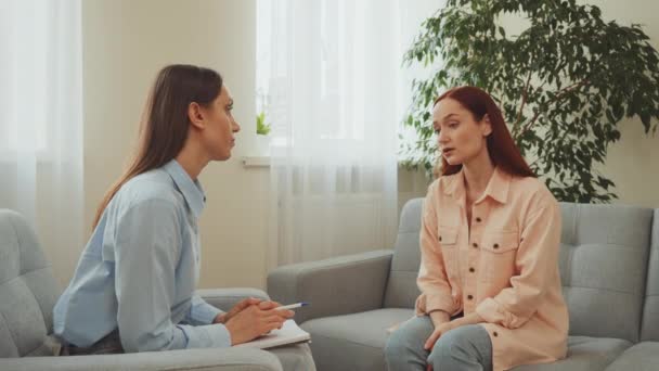 Two Women Engage Focused Meaningful Discussion Therapy Session Therapist Takes — Vídeo de Stock