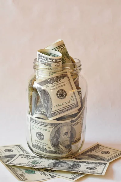 stock image money jar with coins 