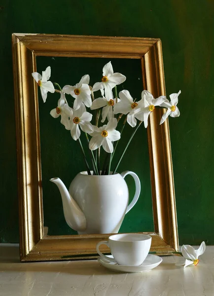 stock image still life with white flowers and a cup of tea 