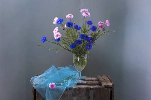 blue flowers in vase