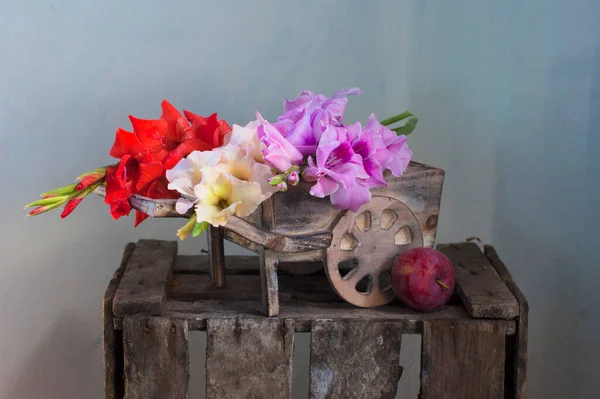 beautiful flowers in wooden vase