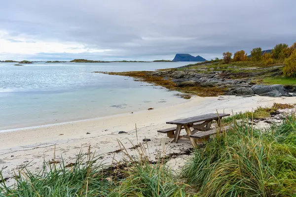 stock image panoramic view with Jetty on the Atlantic near Sommary, Norway. Sandy beach with barbecue area and relaxation area, by the turquoise sea, surrounded by flowers and bushes. like in the Caribbean! relaxing outdoor in northern wilderness