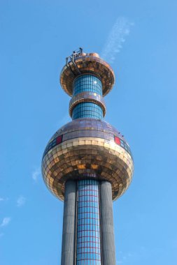 Vienna, Austria, 18 july 2023. The spittelau waste incineration factory hundertwassers iconic creation in vienna, blending art, sustainability, and functionality clipart