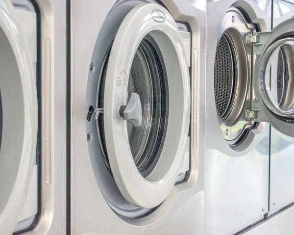 Coin Op Laundry Washing Machine Dryer With Quarters Stock Photo - Download  Image Now - iStock