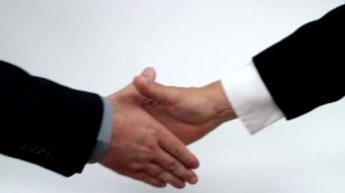 İş adamlarıyla tanışma ve selamlaşma arasında el sıkışma, ortaklık ve anlaşma. Kapatma şirketi.