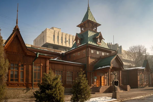 stock image old wooden church in the city