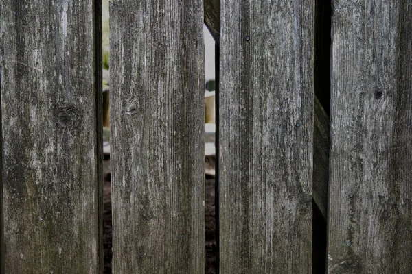 Close Weathered Fence Gaps Slats — стоковое фото