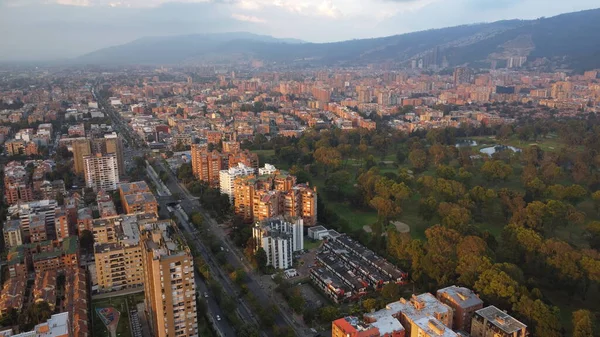 Aerial images of Bogota with its parks and red colors