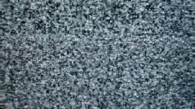 Eski bir televizyon ekranındaki parazit sesine yakından bak. Parazit, rastgele dağılmış siyah beyaz piksellerden oluşur ve bir kar etkisi yaratır..