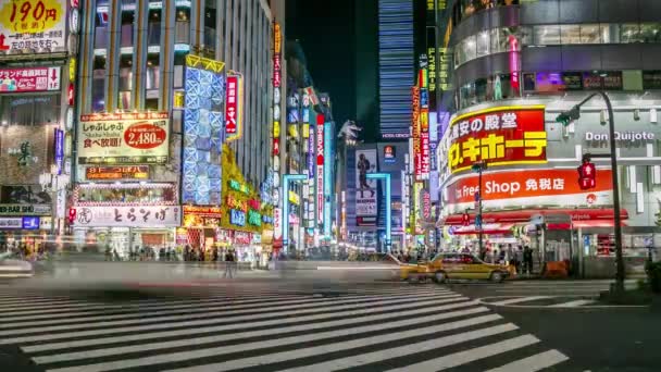 タイムラプス群衆匿名の人々が東京を歩いている 日本の交差点近くの通りで看板 — ストック動画