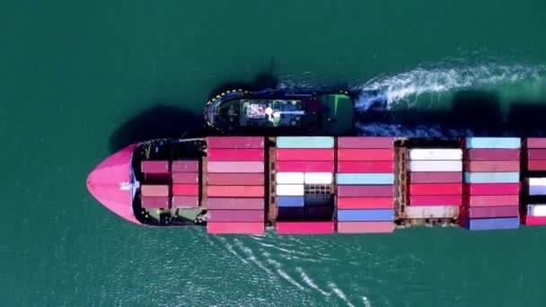Loaded Container Cargo Vessel Traveling Being Assisted Tugboat Docking Harbor — Stock Video