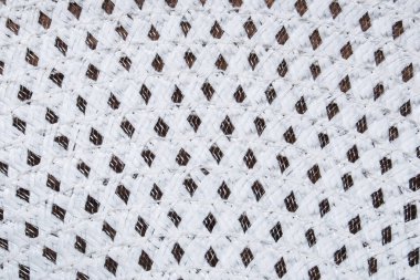 Arkaplan ve tasarım için renk dokusu. Renkli iplikler. Samandan örgü örüyorum. Çantanın ve kumaşın yüzeyi.