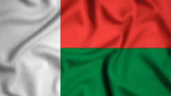 Madagaskar bayrağı rüzgarın arka planında sallanıyor resim, ipek