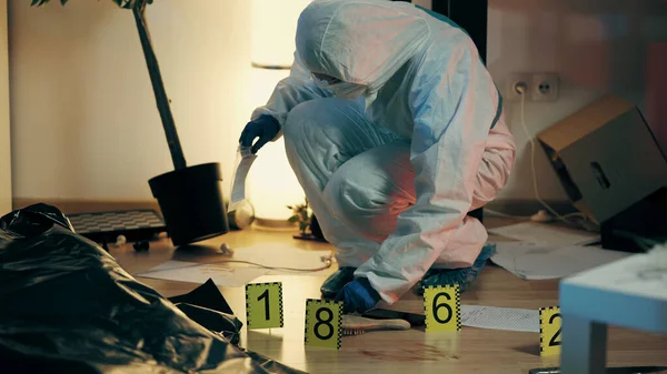 Attentive Worker Forensic Laboratory Collecting Evidence While Examining Crime Scene Royalty Free Stock Photos