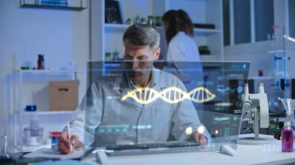 Genetics laboratory worker studying human genome structure on holographic screen