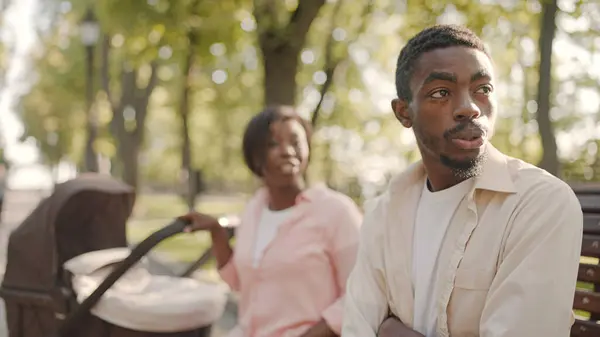 Nervous mother yelling at her indifferent husband, crisis in a relationship