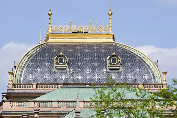 Golden roof and balcony in historical Prague city center near to Charles bridge.