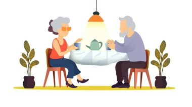 Büyükanne ve büyükbaba, mutfak masasında oturan ve birlikte çay ya da kahve içen yaşlı çift, yaşlı kadınlar, arkadaşlar ve arkadaşlarıyla birlikte huzurevinde, aile hayatında çay içiyorlar.