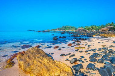 Beautiful landscape of a isolated beach in Goa shot in the morning