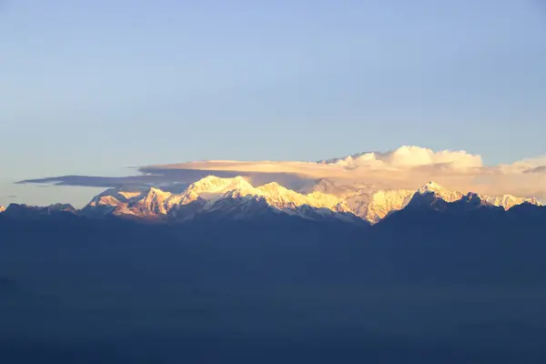 Stock image Kangchenjunga glows golden at sunrise, capturing the majestic beauty of the world's third highest peak. 