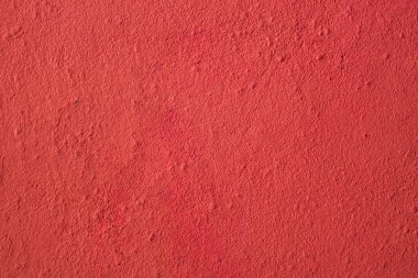 Mesajlar için boş kırmızı duvar arkaplanı. Çimento dokusu.