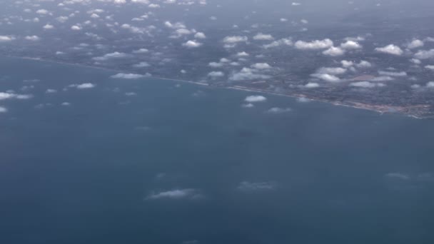 Flying Clouds View Ground Sea Moving Airplane — Vídeo de stock